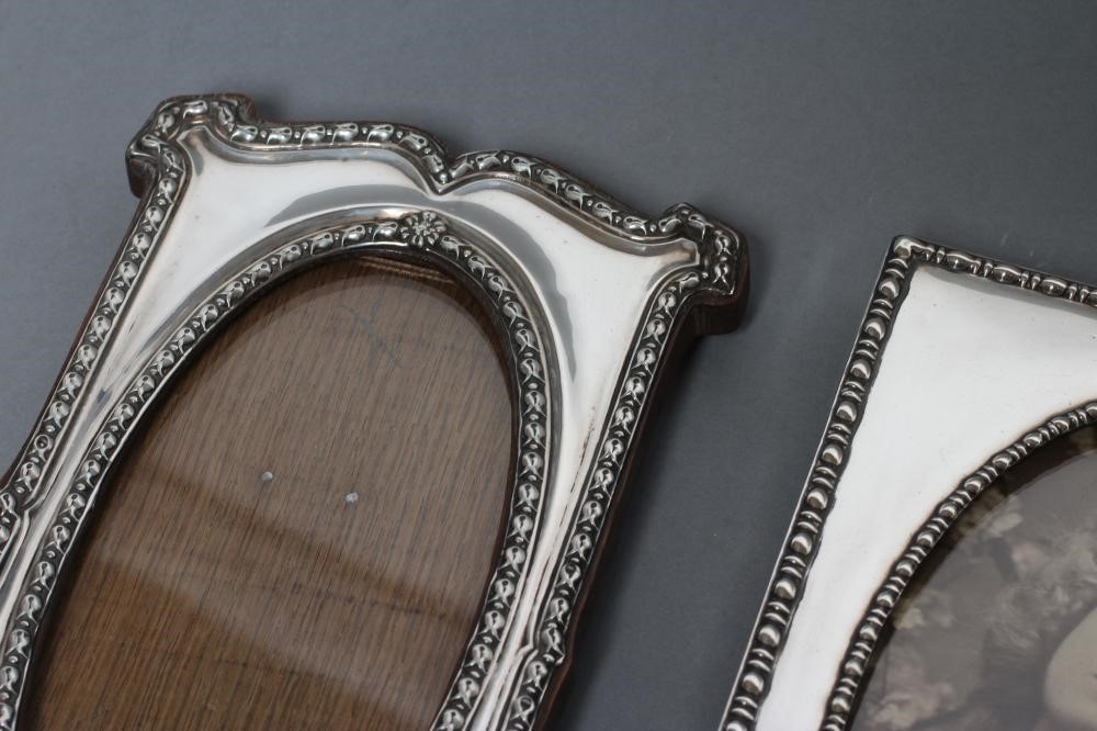 A COLLECTION OF FIVE EASEL BACK PHOTOGRAPH FRAMES Image