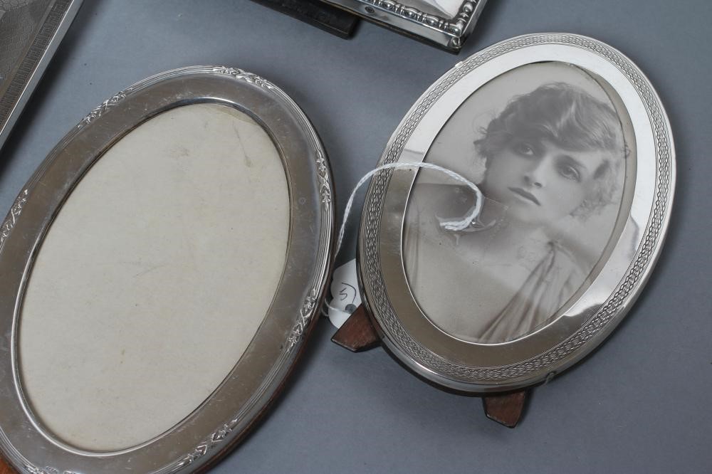 A COLLECTION OF FIVE EASEL BACK PHOTOGRAPH FRAMES Image