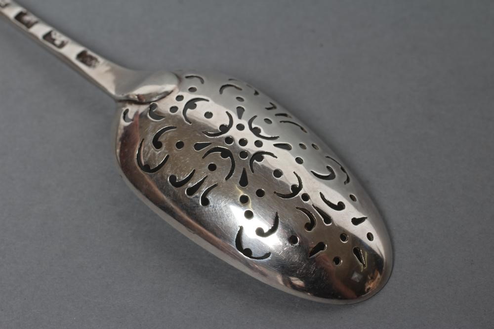 A LARGE PRICKET SPOON Image