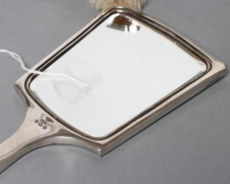 AN ART DECO SILVER AND GREEN ENAMEL COMPOSITE FIVE PIECE DRESSING TABLE SET Image