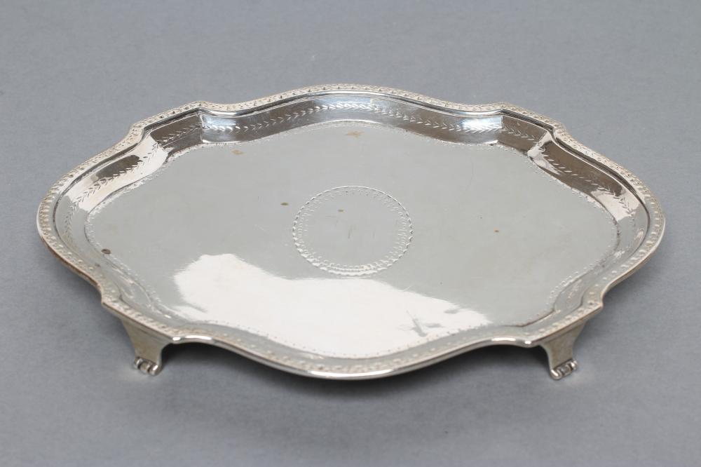 A GEORGE III TEAPOT STAND Image