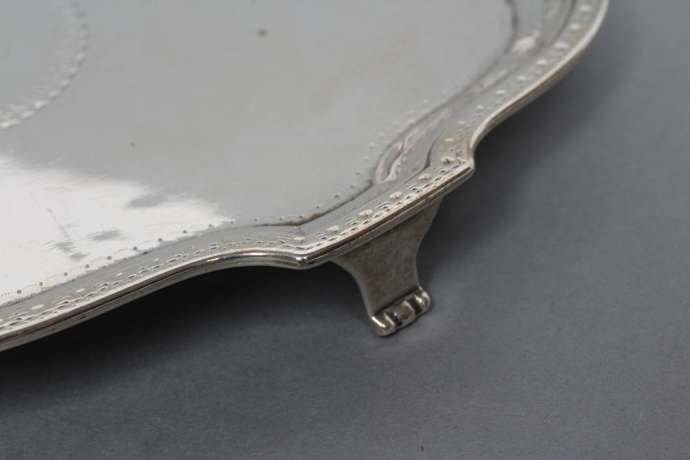 A GEORGE III TEAPOT STAND Image