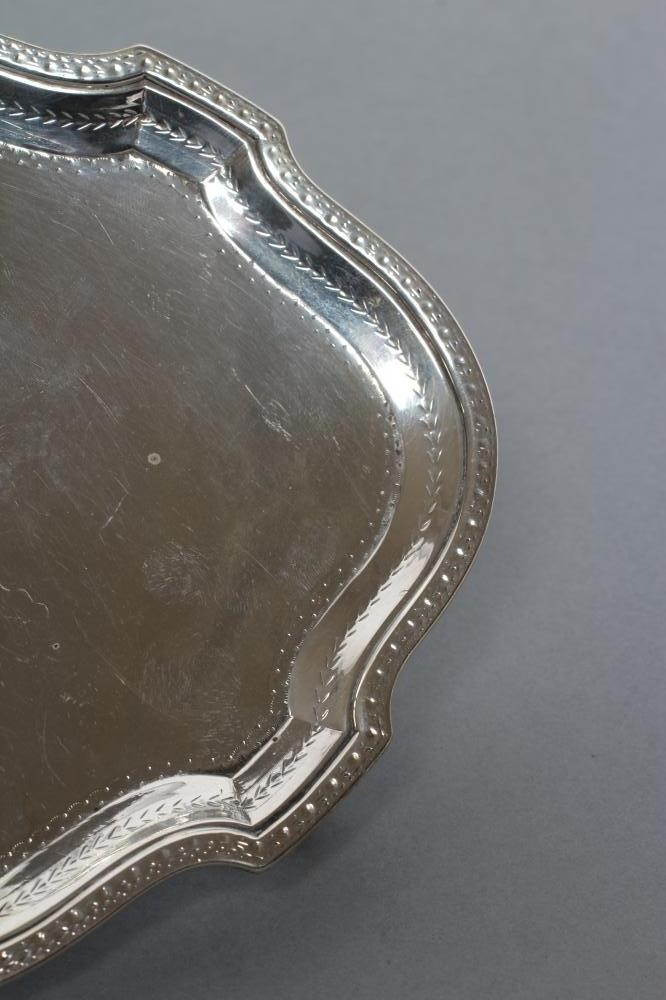 A GEORGE III TEAPOT STAND Image