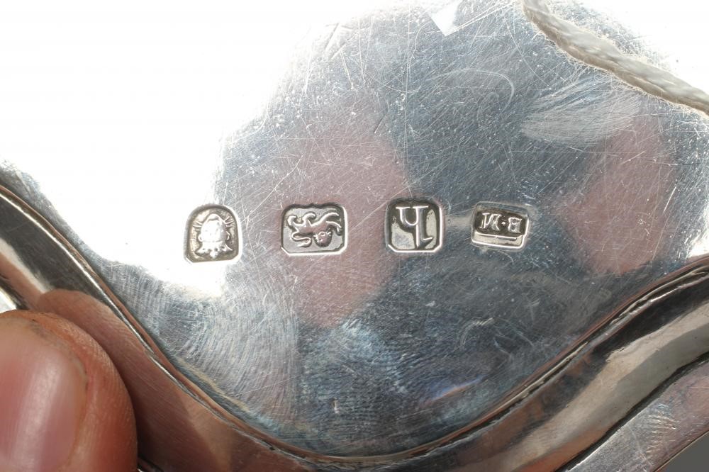 A GEORGE III TEAPOT STAND Image