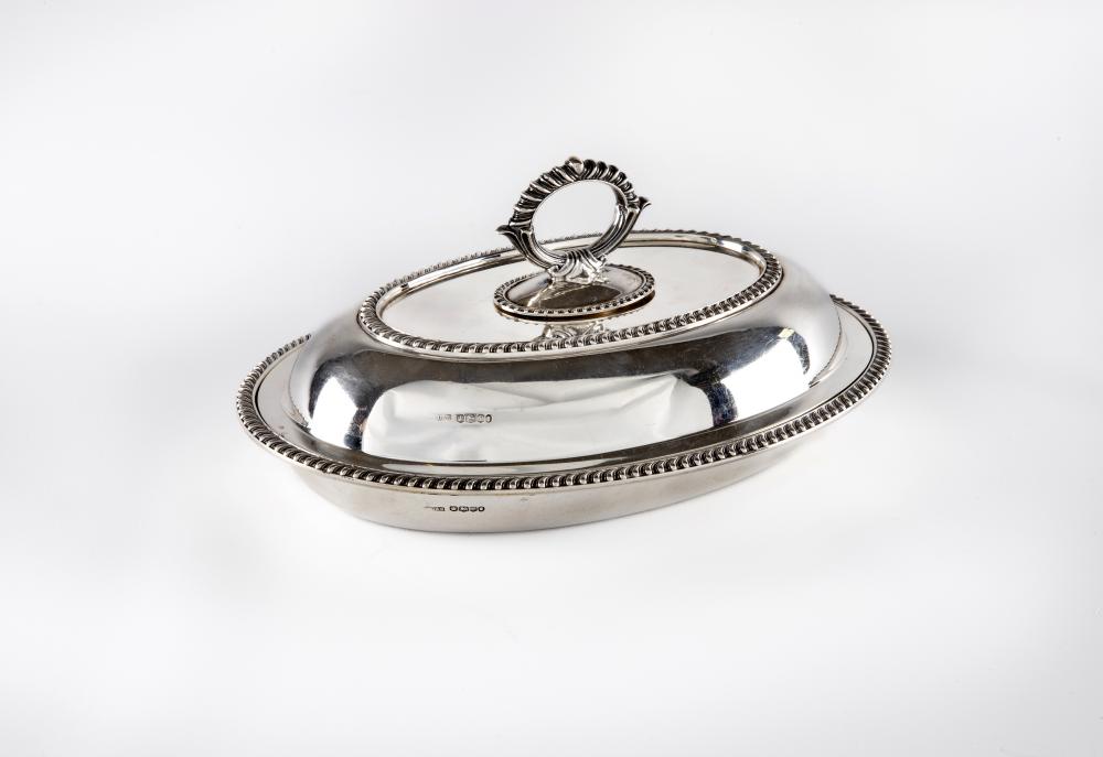 AN ENTREE DISH AND COVER Image