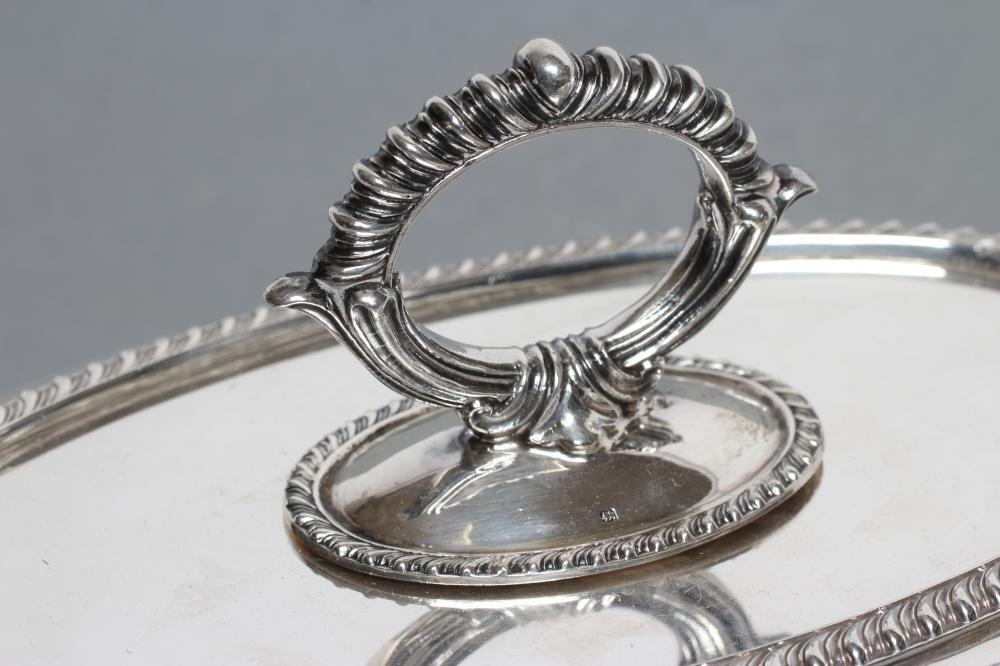 AN ENTREE DISH AND COVER Image