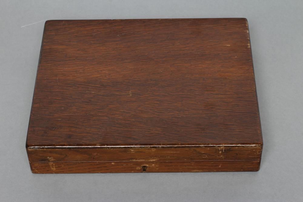 AN EDWARDIAN SET OF EIGHT PAIRS OF FRUIT KNIVES AND FORKS Image