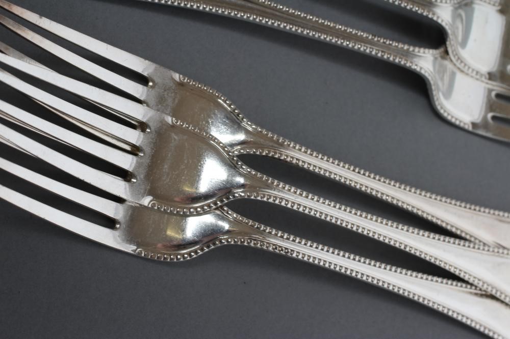 A LATE VICTORIAN SET OF SIX DESSERT FORKS Image