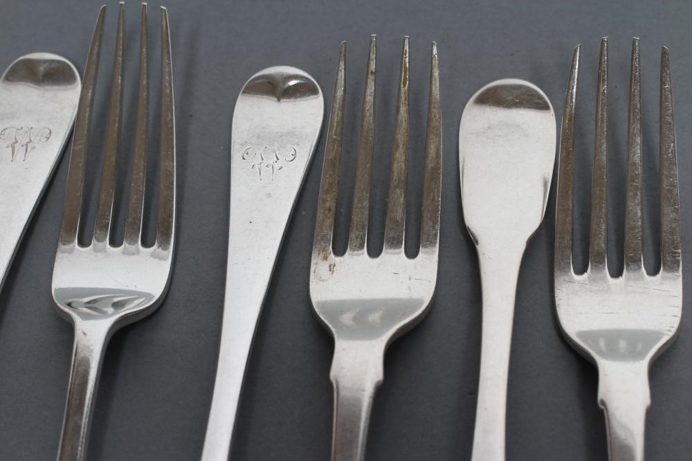 A MATCHED AND COMPOSITE SET OF SIX LATE GEORGE III DESSERT FORKS Image