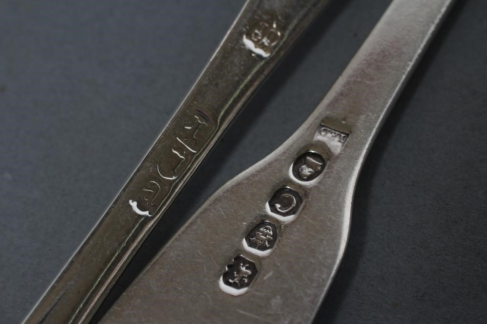 A MATCHED AND COMPOSITE SET OF SIX LATE GEORGE III DESSERT FORKS Image