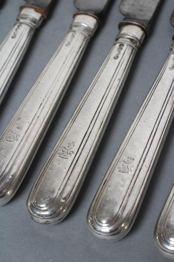A SET OF TWELVE WILLIAM IV DESSERT KNIVES Image