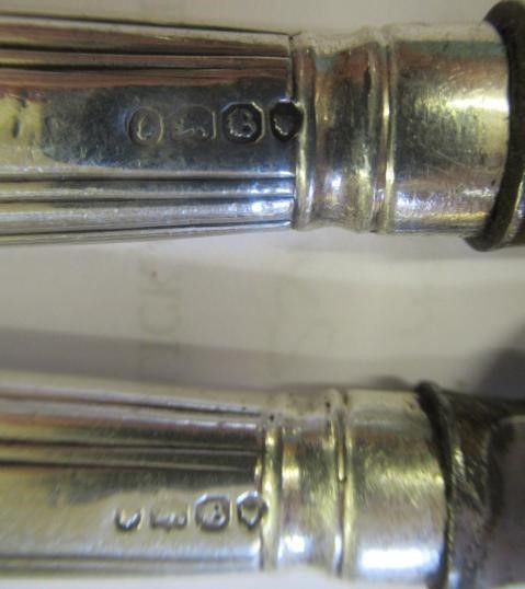 A SET OF TWELVE WILLIAM IV DESSERT KNIVES Image