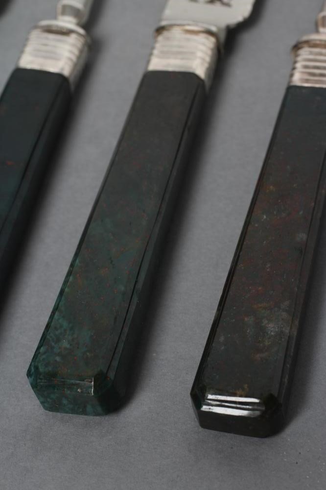 TWO PAIRS OF DESSERT KNIVES AND FORKS Image