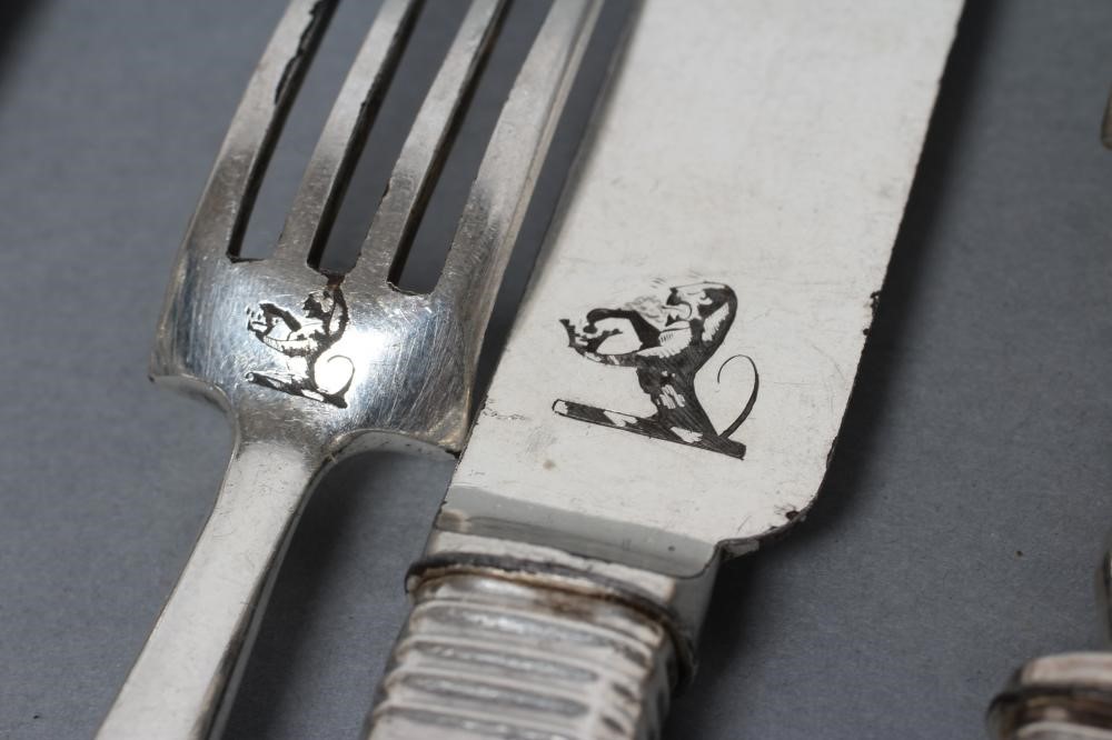 TWO PAIRS OF DESSERT KNIVES AND FORKS Image