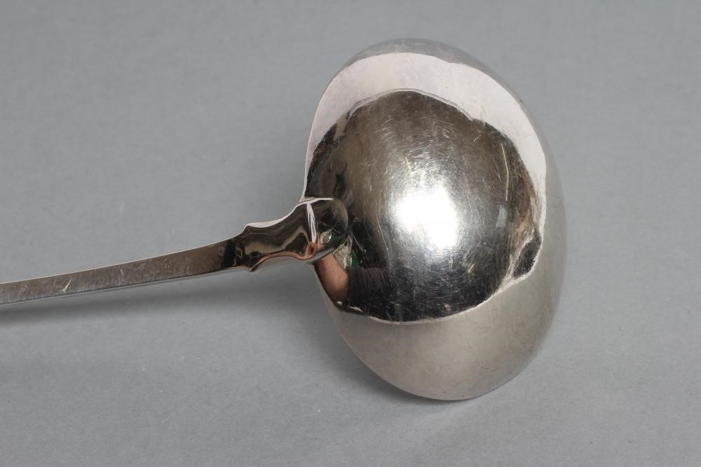 A LATE GEORGE III SOUP LADLE Image