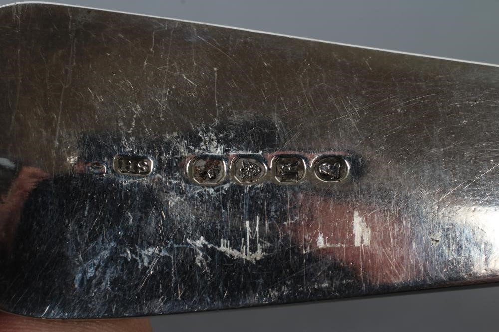 A LATE GEORGE III SOUP LADLE Image