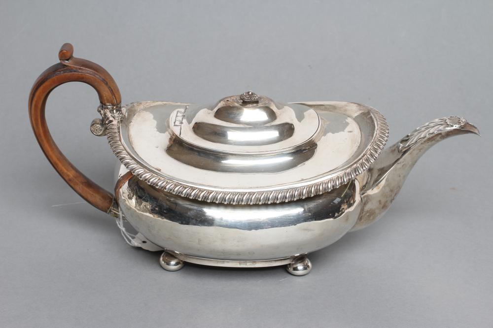 A LATE GEORGE III TEAPOT Image