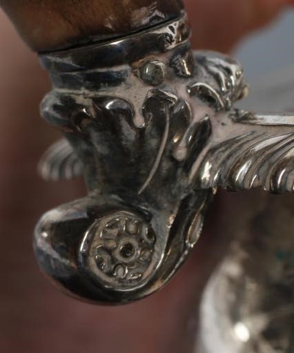 A LATE GEORGE III TEAPOT Image