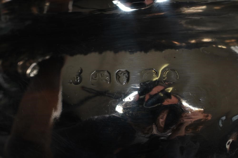 A LATE GEORGE III TEAPOT Image