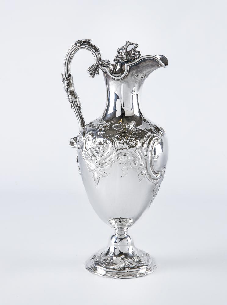 A MID VICTORIAN CLARET JUG Image