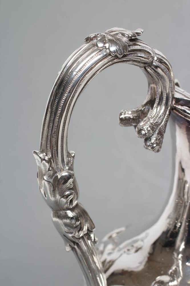 A MID VICTORIAN CLARET JUG Image