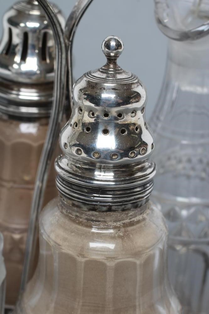 A GEORGE III FOUR BOTTLE CRUET Image