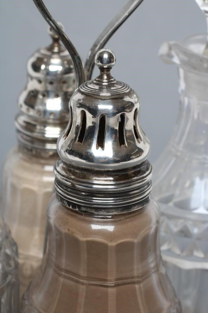 A GEORGE III FOUR BOTTLE CRUET Image