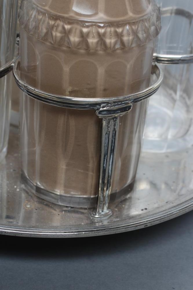 A GEORGE III FOUR BOTTLE CRUET Image