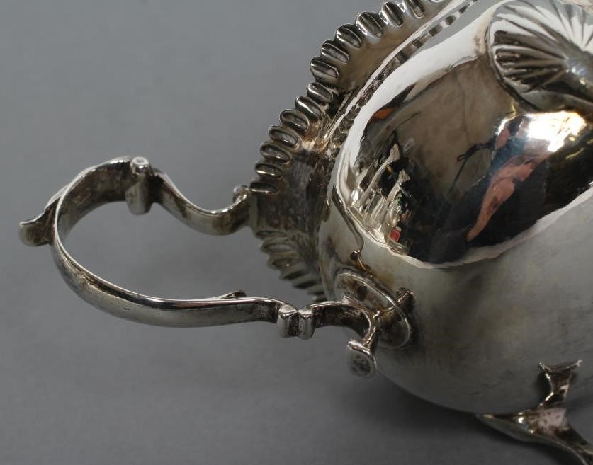 A LATE GEORGE III SAUCEBOAT Image