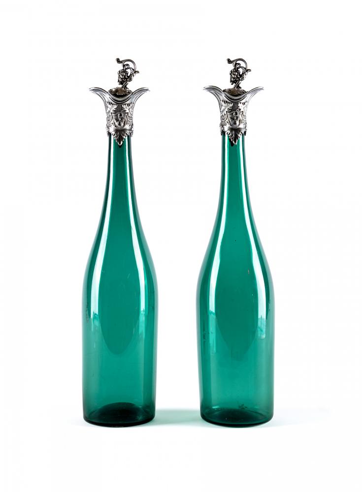 A PAIR OF VICTORIAN BRISTOL GREEN GLASS BOTTLE DECANTERS Image
