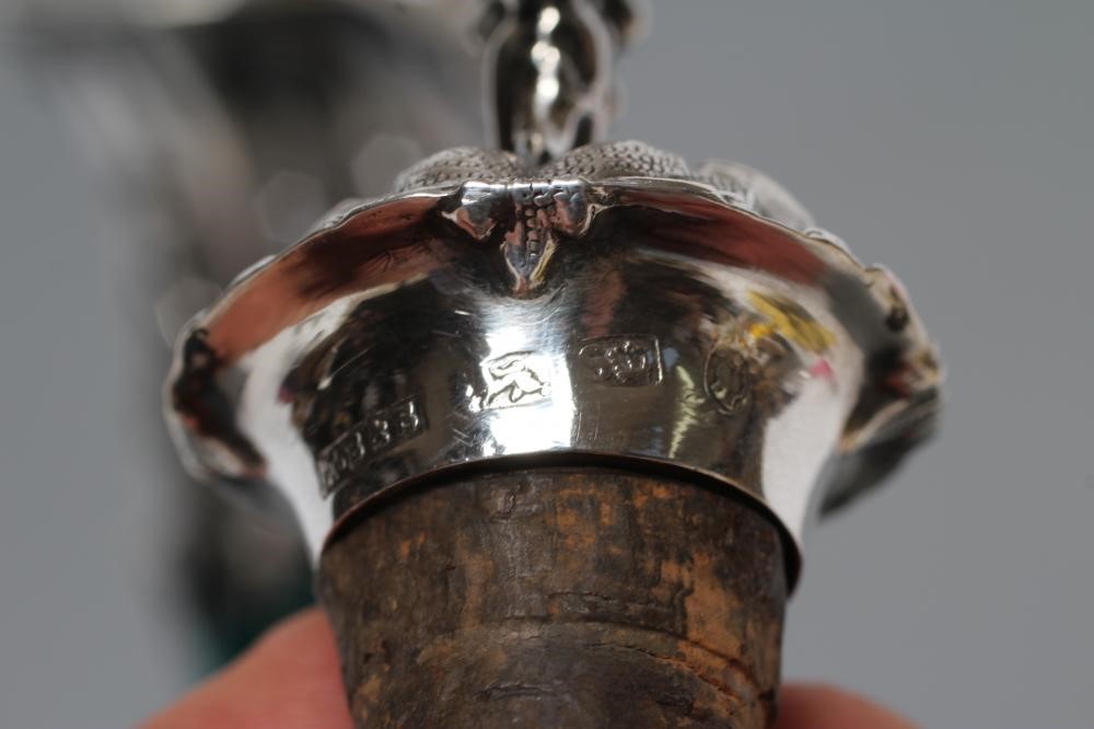 A PAIR OF VICTORIAN BRISTOL GREEN GLASS BOTTLE DECANTERS Image