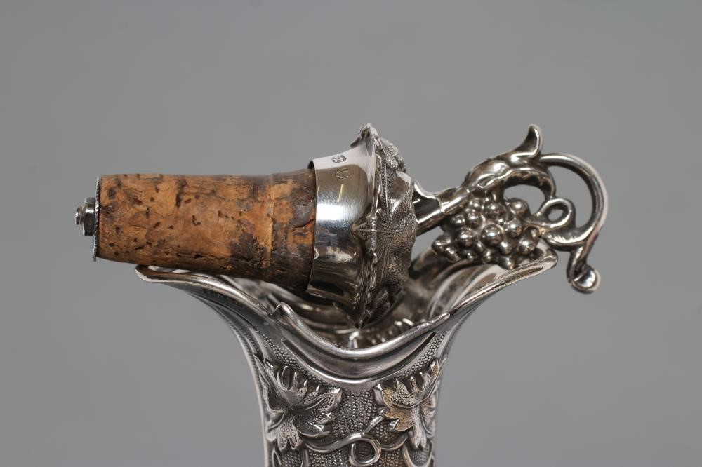 A PAIR OF VICTORIAN BRISTOL GREEN GLASS BOTTLE DECANTERS Image