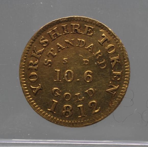 A GEORGE III GOLD HALF GUINEA TOKEN Image