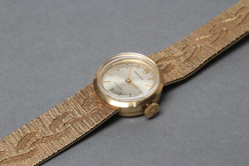 A LADY'S 9CT GOLD ROLEX WRISTWATCH Image