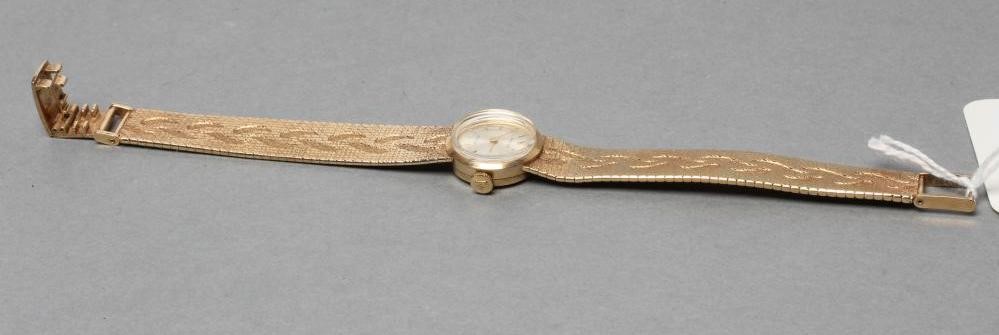 A LADY'S 9CT GOLD ROLEX WRISTWATCH Image