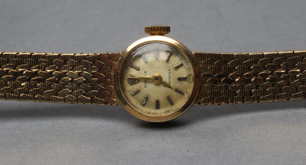 A LADY'S 9CT GOLD ROLEX WRISTWATCH Image