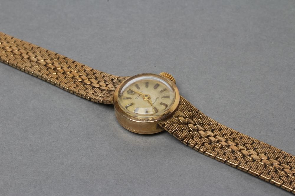 A LADY'S 9CT GOLD ROLEX WRISTWATCH Image