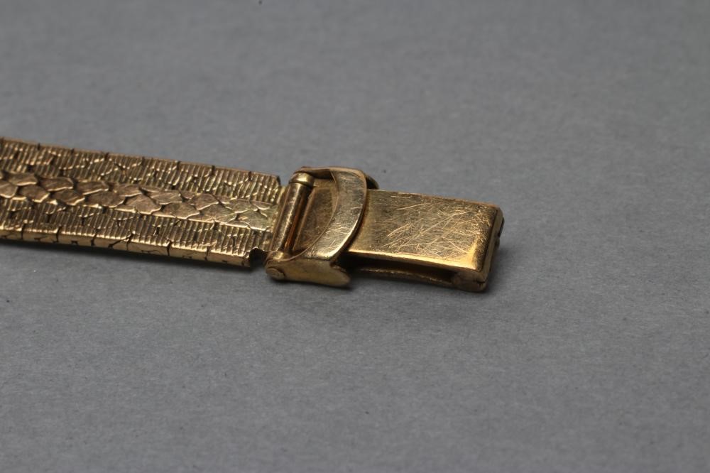 A LADY'S 9CT GOLD ROLEX WRISTWATCH Image