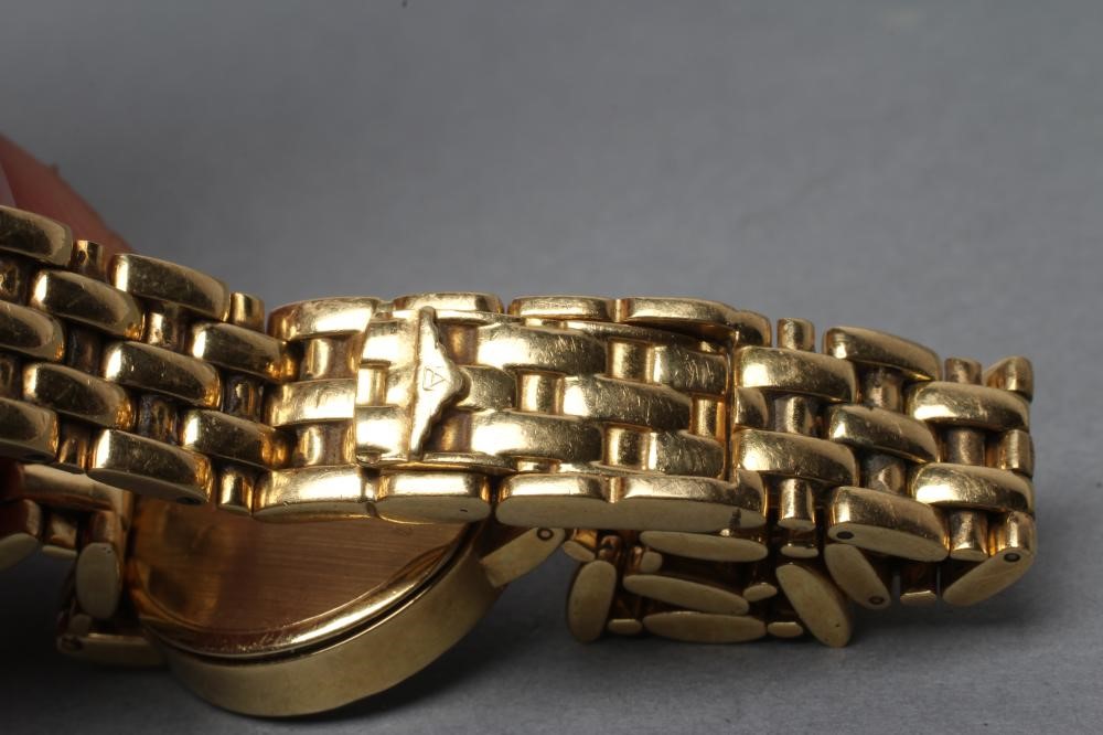 A LADY'S LONGINES 18CT GOLD AND DIAMOND WRISTWATCH Image