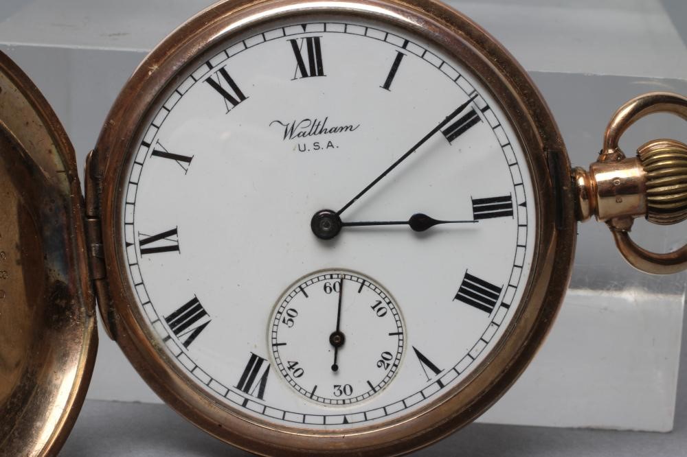 A 9ct gold waltham hunter top wind pocket watch Hartleys Auctioneers Valuers