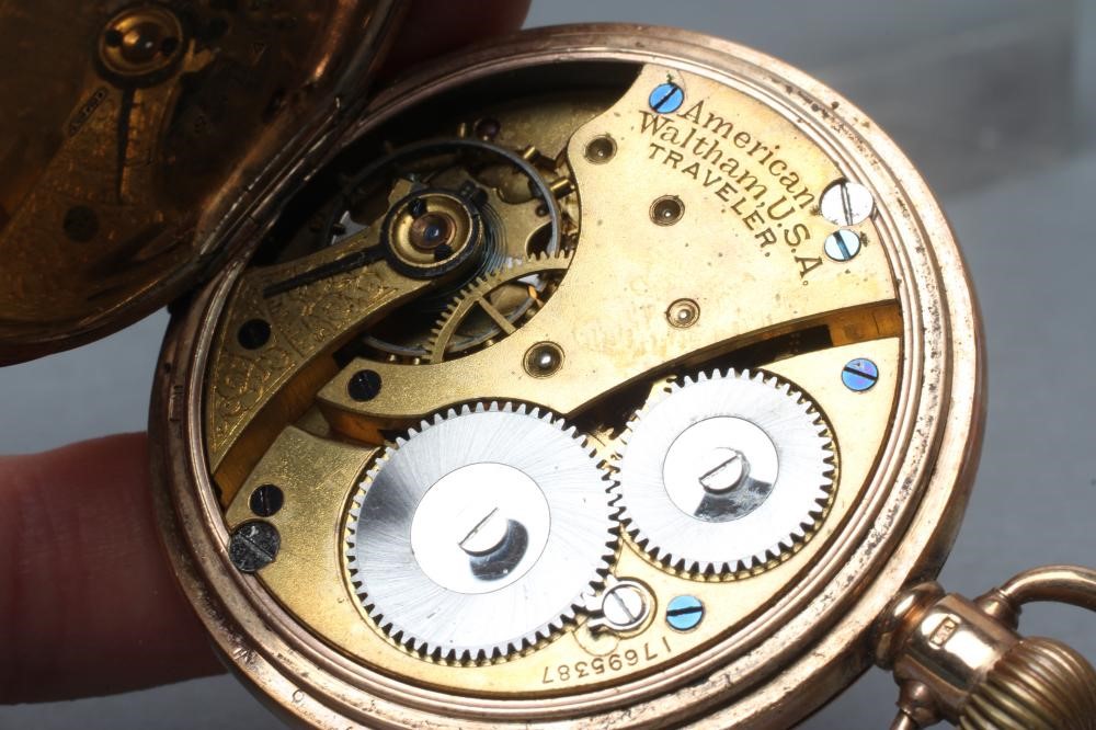 A 9ct gold waltham hunter top wind pocket watch Hartleys Auctioneers Valuers