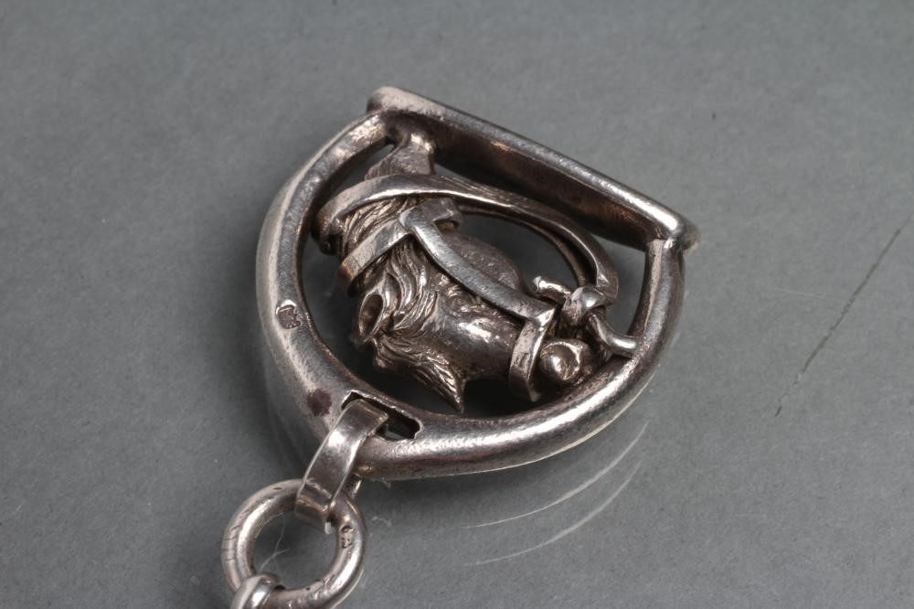 A HEAVY SILVER TRIPLE HORSE BRACELET Image