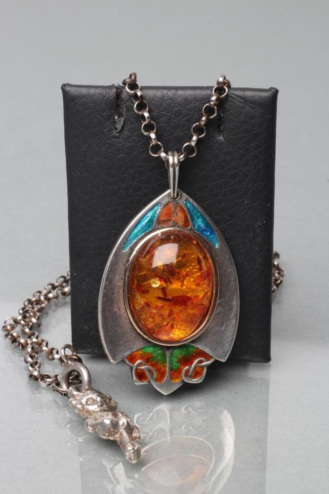 AN ARTS AND CRAFTS SILVER AND ENAMEL PENDANT Image