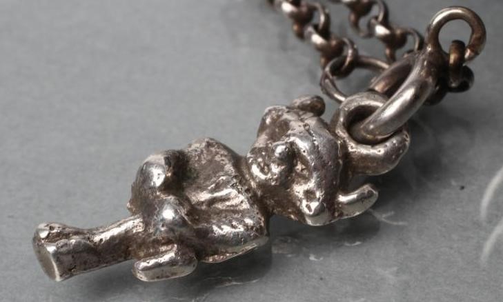 AN ARTS AND CRAFTS SILVER AND ENAMEL PENDANT Image