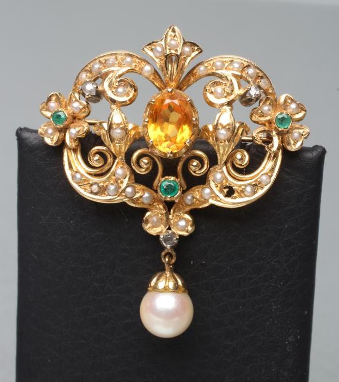 A MULTI-GEM SET 18CT GOLD RENAISSANCE STYLE BROOCH/PENDANT of open cartouche form Image