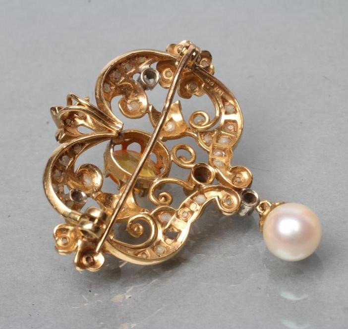 A MULTI-GEM SET 18CT GOLD RENAISSANCE STYLE BROOCH/PENDANT of open cartouche form Image