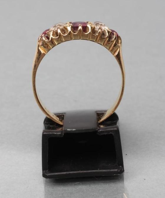 A FIVE STONE RUBY AND DIAMOND RING Image