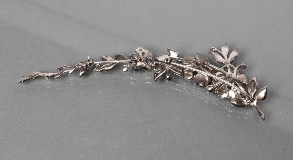 A MID CENTURY PASTE AND SILVER TWO PIECE BROOCH Image
