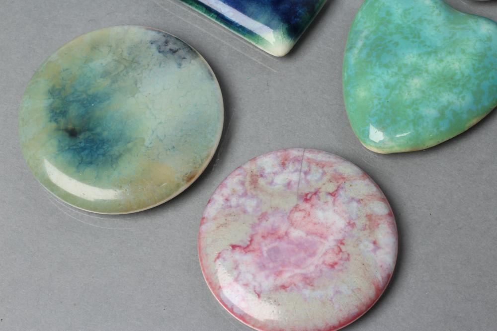 FOUR RUSKIN POTTERY BROOCH PANELS Image