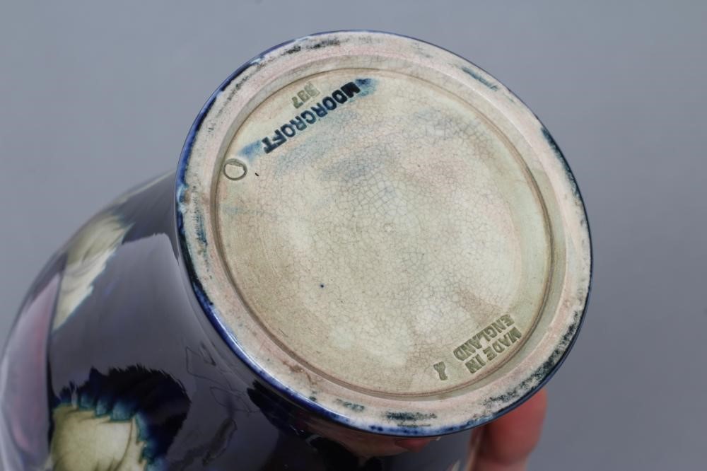 A MOORCROFT POTTERY PANSY PATTERN VASE Image